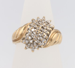 A 9ct yellow gold diamond set ring size N, 4.3 grams