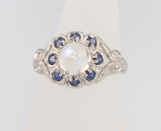 A 9ct white gold moonstone and gem set ring size O 1/2