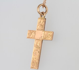 A 9ct rose gold engraved cross pendant and chain 8.3 grams