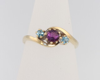 A 9ct yellow gold amethyst and topaz ring size l, 2 grams