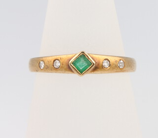 A 9ct yellow gold emerald and diamond ring size N, 2.6 grams