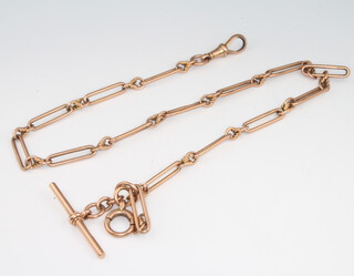 A 9ct yellow gold fancy link Albert with T-Bar and clasp 24.3 grams