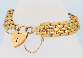 A 9ct yellow gold gate bracelet and padlock 18.3 grams