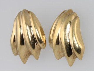 A pair of 9ct yellow gold scroll earrings and a smaller stud pair 6.9 grams