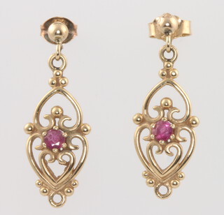 A pair of 9ct yellow gold ruby drop earrings 