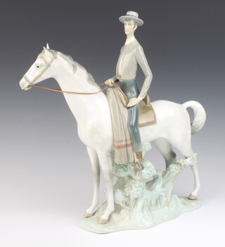 A Lladro figure of a Spanish gentleman on horseback by Salvador Furio 40cm 