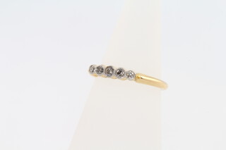 An 18ct yellow gold 5 stone diamond ring size L, 2.9 grams