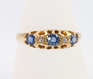 An 18ct yellow gold sapphire and diamond ring, size U, 3 grams