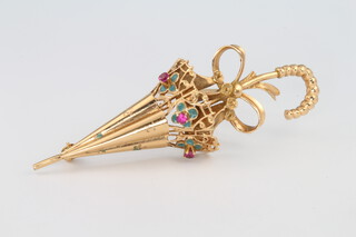 An 18ct yellow gold gem set umbrella brooch, 7.7 grams 