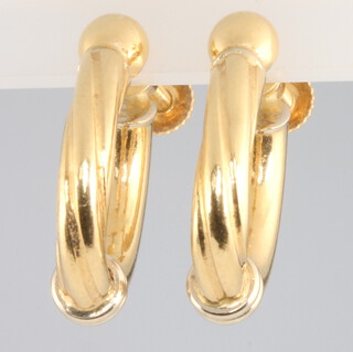 A pair of 18ct yellow gold hoop earrings, 2.4 grams