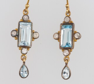 A pair of silver gilt topaz and diamond earrings 