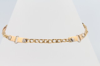 An 18ct two colour gold Cartier style bracelet 4.2 grams 