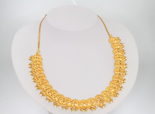 An Indian 22ct yellow gold repousse necklace, 34.9 grams 