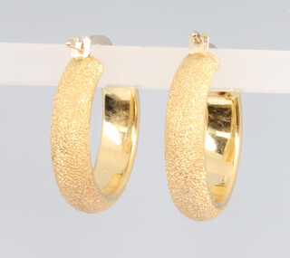A pair of 18ct yellow gold hoop earrings 3.1 grams