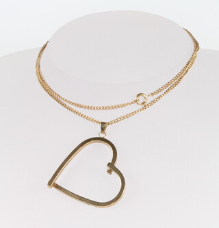 A 9ct yellow gold heart shaped pendant and chain 4.8 grams 