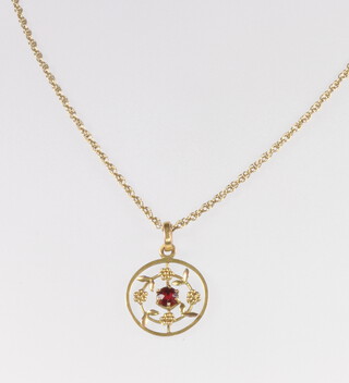 A 9ct yellow gold garnet pendant and chain 3.3 grams 