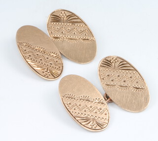 A pair of 9ct yellow gold engraved oval cufflinks 4.2 grams 