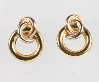 A pair of 18ct yellow gold hollow hoop earrings 2.8 grams 