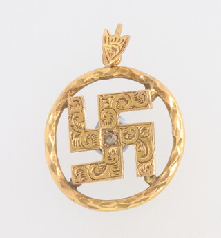 A 21ct yellow gold diamond pendant, 3 grams