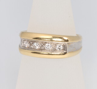 A 14ct yellow gold diamond ring, size O, 6.1 grams