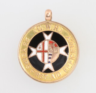 A 9ct yellow gold enamelled First Aid fob, 6.4 grams