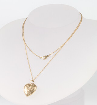 A 9ct yellow gold heart locket and chain 3.9 grams 