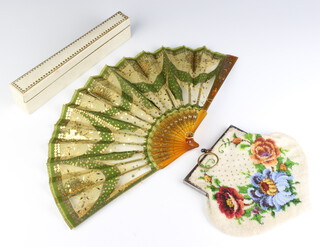 A Victorian beadwork purse with floral decoration together with a faux tortoiseshell fan 
