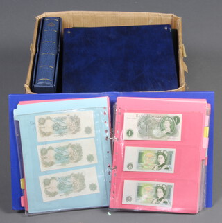 An album of GB and world bank notes including an 1886 Stockton five pound note (trimmed), minor armed forces notes etc, a quantity of reference books, empty albums, coins etc   