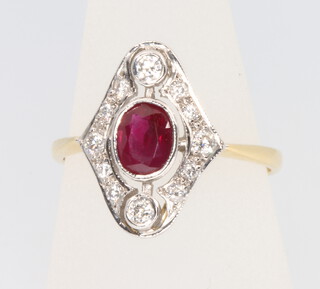 An 18ct yellow gold Edwardian style ruby and diamond ring, the centre stone approx 0.85ct surrounded by brilliant cut diamonds approx. 0.3ct, size L 1/2