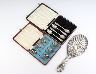 A set of 6 silver teaspoons Sheffield 1934, 4 silver ditto and a silver backed handmirror