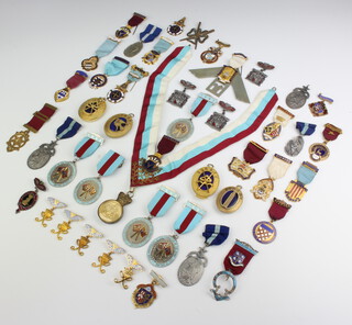 A silver and enamelled Masonic jewel and minor jewels 