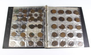 A folder of pre-decimal coinage 