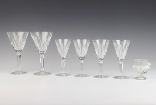Two Waterford Crystal champagne glasses, 4 small wines and a French moulded glass egg cup 