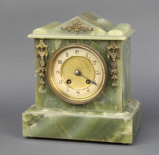 Hamburg American Clock Company, a striking 8 day mantel clock with paper dial and Arabic numerals contained in an onyx case 