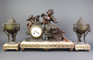 Samuel Marti, a French bronze and pink veined marble clock garniture comprising mantel clock with enamelled dial and Arabic numerals contained in a spelter case in the form of a seated female violinist and cherub, the front of the clock marked Melodie Par L.F. Morau Mlla d'or striking on bell together with a pair of lidded urns on marble columns 