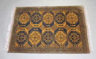 A black and brown ground Afghan rug with 10 stylised medallions  to the centre 152cm x 104cm 