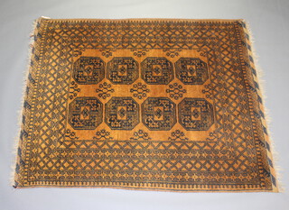 A brown and black ground Afghan rug with 8 octagons to the centre within a multirow border 186cm x 155cm  