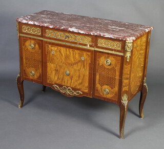 A 19th/20th Century French inlaid mahogany commode with shaped pink veined marble top and gilt metal mounts, fitted a secret drawer above 2 long drawers, raised on cabriole supports 86cm h x 111cm w x 49cm d  