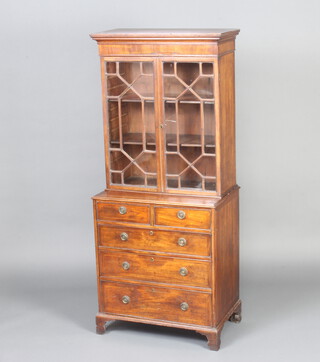 A Georgian mahogany display cabinet with moulded cornice, fitted shelves enclosed by astragal glazed panelled doors, raised on an associated chest of 2 short and 3 long drawers with satinwood and ebonised stringing, on bracket feet 136cm h x 57cm w x 36cm d  