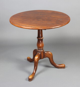A Georgian style circular elm tea table raised on a turned column and tripod base 74cm h x 77cm diam. 