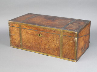 A Victorian figured walnut and brass banded writing slope with hinged lid, the base fitted a secret drawer 19cm x 49cm x 25cm 