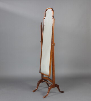 A 1930's Queen Anne style arched plate cheval mirror contained in a walnut frame 162cm h x 40cm w x 47cm d 
