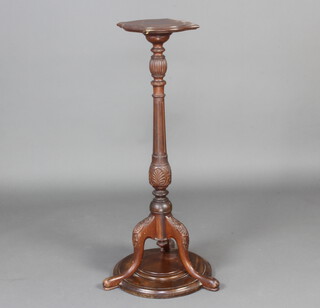 An Edwardian shaped jardiniere stand raised on turned, fluted and reeded column tripod base 107cm h x 28cm w x 28cm d 