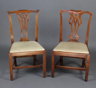 A Georgian Chippendale style mahogany slat back dining chair with pierced vase shaped slat back and upholstered drop in seat, together with a similar chair (both frames are loose) 
