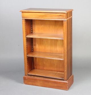 A Georgian style inlaid mahogany open bookcase with adjustable shelves, raised on a platform base 104cm h x 64cm w x 29cm d 
