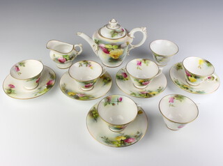 A Royal Worcester tea set decorated with roses comprising teapot, milk jug, sugar bowl, 6 cups and 5 saucers 