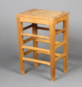A rectangular light oak Arts and Crafts style ladder back stool 59cm h x 40cm w x 29cm d 