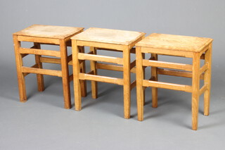 Three Arts and Crafts style oak  stools 49cm h x 39cm w x 27cm d 