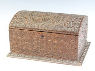An Anglo Indian domed carved hardwood trinket box with hinged lid 19cm x 33cm x 25cm 