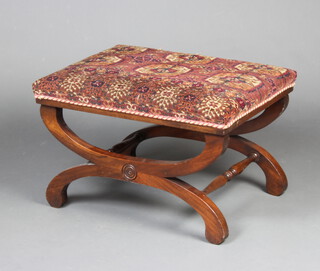 A 19th Century style rectangular footstool, the seat upholstered in Afghan carpet raised on X framed support 40cm x 65cm x 48cm 